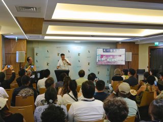 The Cultural and Creative Industries Development Agency under the Culture, Sports and Tourism Bureau led an industry delegation to the Annecy International Animation Film Festival and Market 2026 in France from June 23 to 26 (Annecy time), and sponsored the industry to set up the Hong Kong Pavilion and hold the Hong Kong Partner Pitches at the event. Photo shows a representative from the Hong Kong animation industry introducing Hong Kong productions to overseas counterparts and investors at the Hong Kong Partner Pitches.